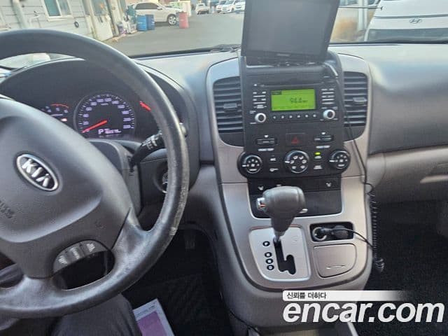 Kia Carnival R люксовая версия, 2012 12