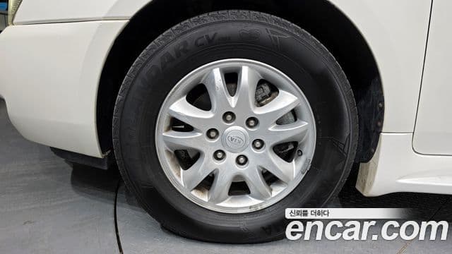 Kia Carnival R Grand Carnival GLX, 2011 все фото