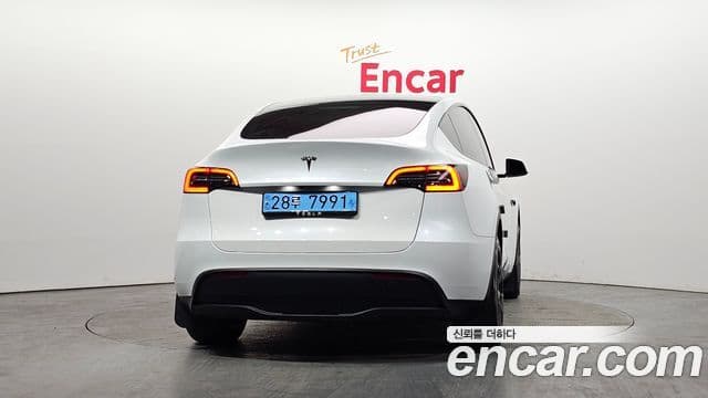 Tesla модель Y, 2024 4