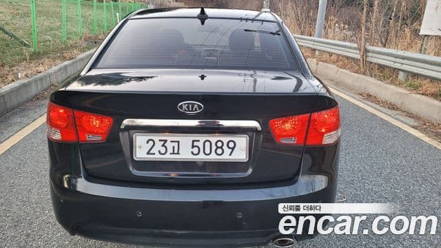 Kia Forte чёрный, 2010 все фото