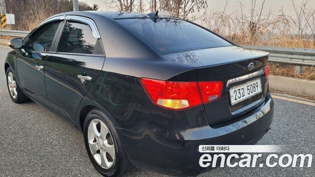 Kia Forte чёрный, 2010 6