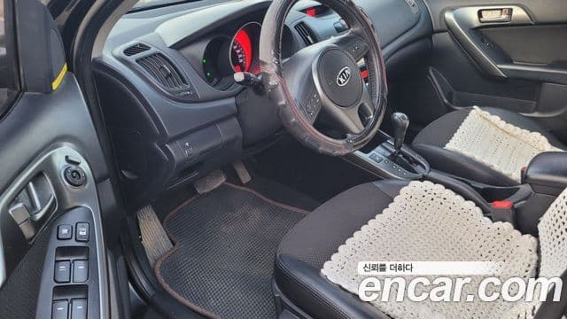 Kia Forte чёрный, 2010 9