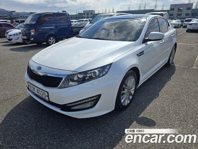 Kia K5 коричневый, 2011 1