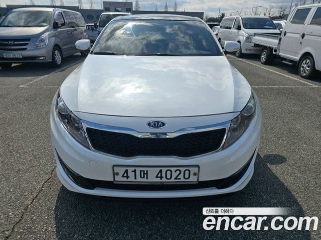 Kia K5 коричневый, 2011 3