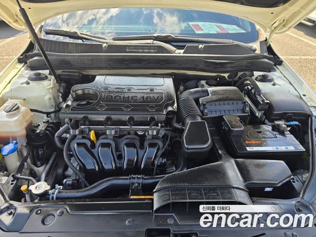 Kia K5 коричневый, 2011 6