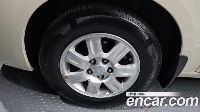 Kia 뉴카렌스 топовая версия, 2011 все фото