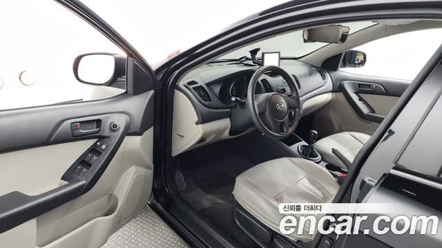 Kia Forte люксовая версия, 2009 10
