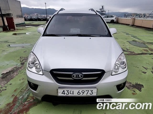Kia 뉴카렌스 люксовая версия Family, 2009 3