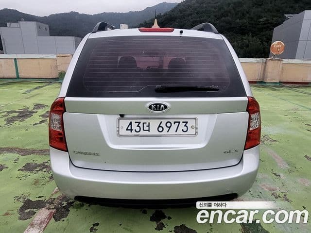 Kia 뉴카렌스 люксовая версия Family, 2009 4