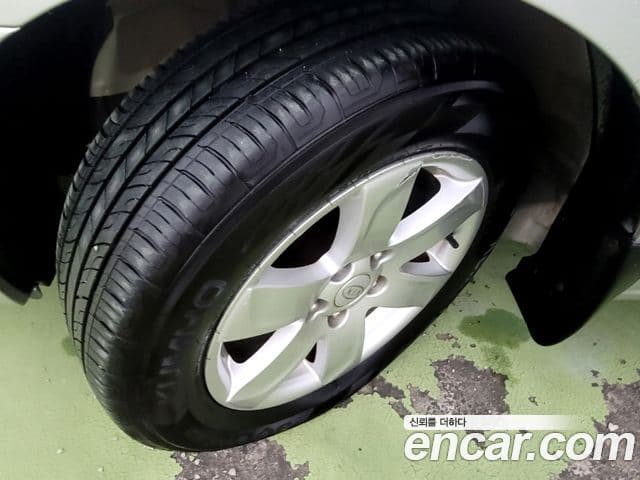 Kia 뉴카렌스 люксовая версия Family, 2009 все фото