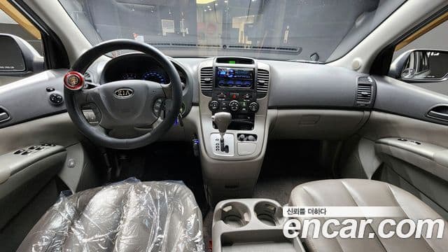 Kia Carnival R люксовая версия, 2012 7