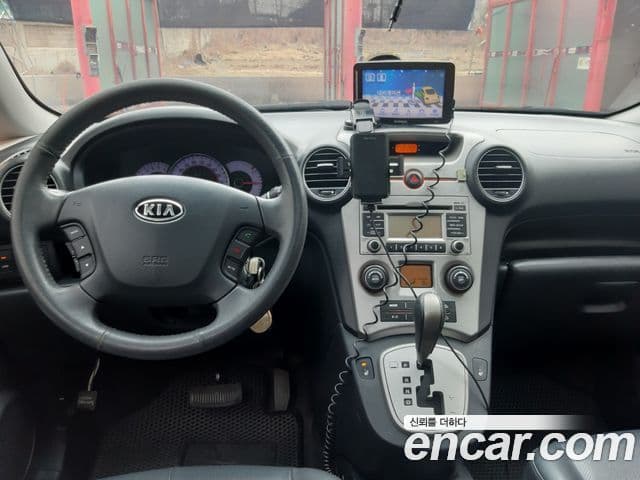 Kia 뉴카렌스 топовая версия, 2010 7
