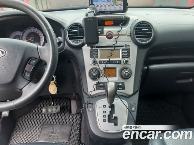 Kia 뉴카렌스 топовая версия, 2010 9