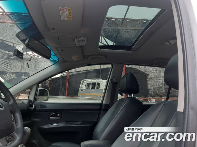 Kia 뉴카렌스 топовая версия, 2010 11