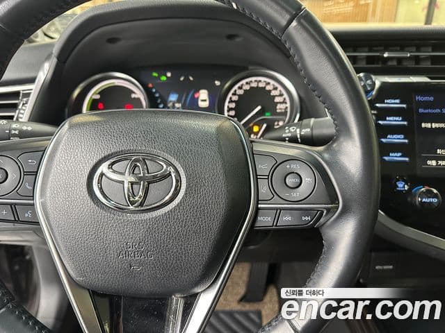 Toyota 캠리 (XV70) 2.5 XLE гибрид, 2018 14