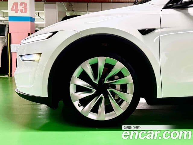 Tesla модель Y Long Range AWD, 2025 все фото