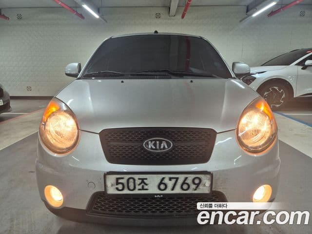 Kia 뉴모닝 люксовая версия Black Premium, 2010 2
