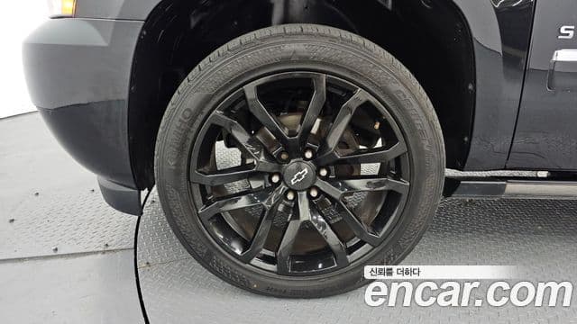 Chevrolet Suburban, 2013 все фото