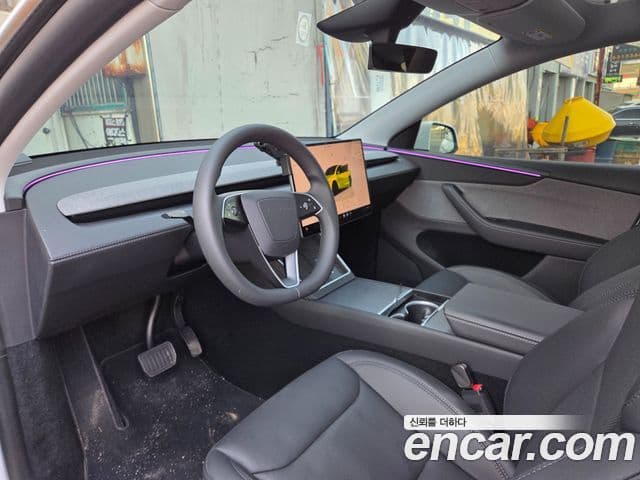 Tesla модель Y, 2025 7