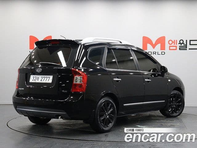 Kia 뉴카렌스 люксовая версия, 2011 3