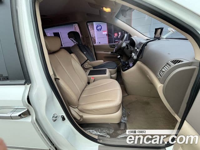 Kia Carnival R люксовая версия, 2014 10