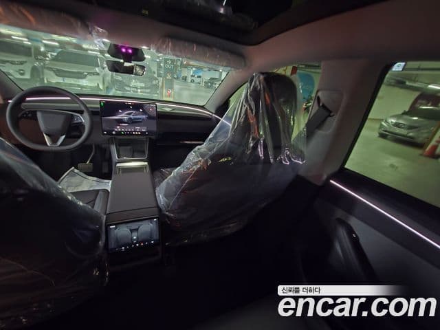 Tesla модель Y, 2025 4