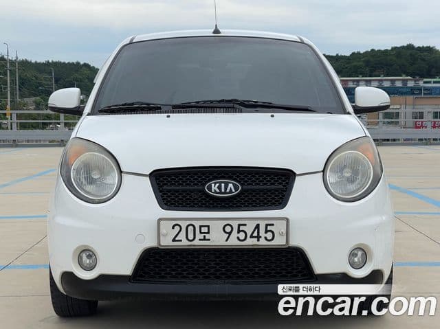 Kia 뉴모닝 люксовая версия Black Premium, 2010 1