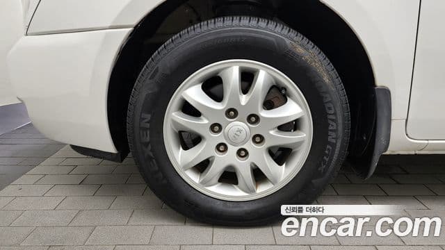 Kia Carnival R топовая версия, 2012 все фото