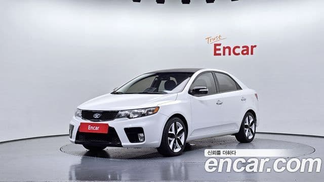 Kia Forte чёрный, 2010 1