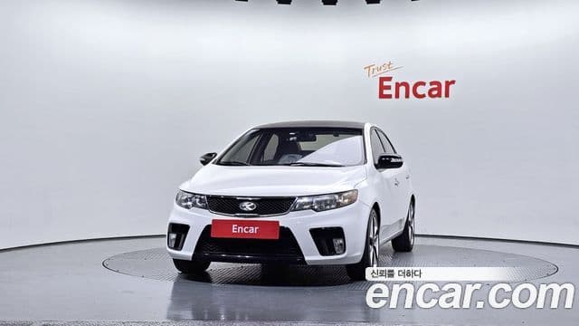 Kia Forte чёрный, 2010 3