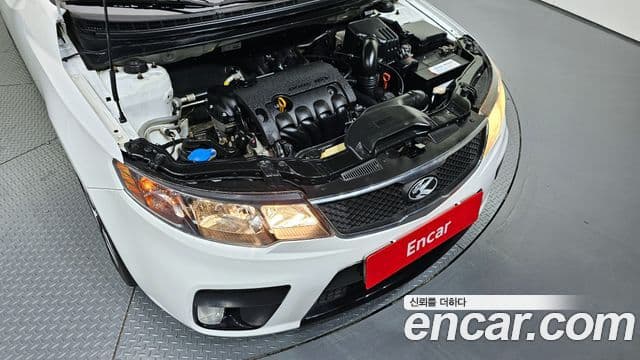 Kia Forte чёрный, 2010 6