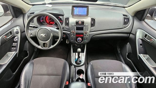 Kia Forte чёрный, 2010 7