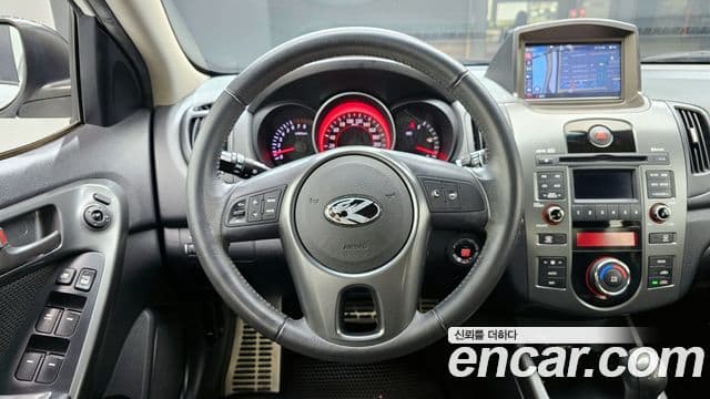 Kia Forte чёрный, 2010 14