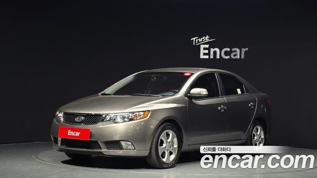 Kia Forte чёрный, 2009 1