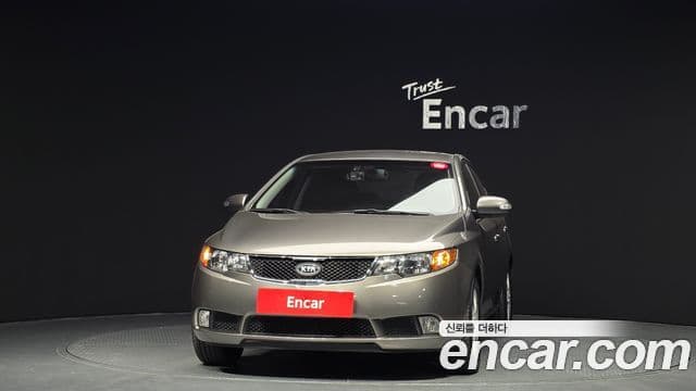 Kia Forte чёрный, 2009 3