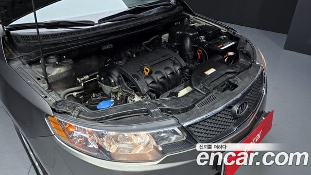 Kia Forte чёрный, 2009 6