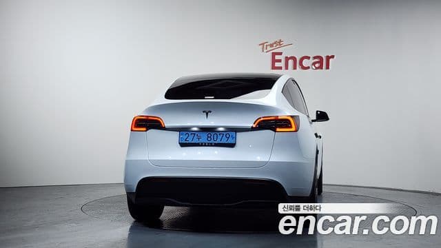 Tesla модель Y, 2025 4
