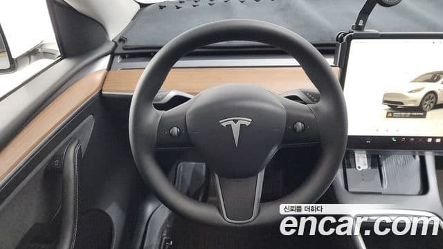 Tesla модель Y, 2025 14