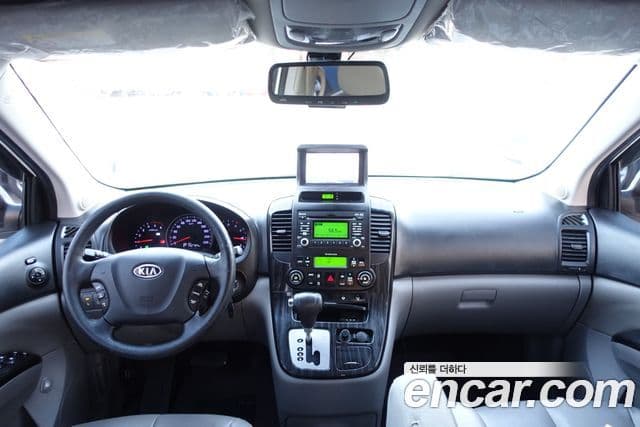 Kia Carnival R топовая версия, 2012 7