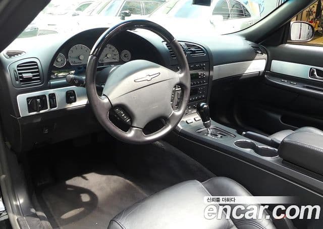 Ford 썬더버드 кабриолет, 2004 4