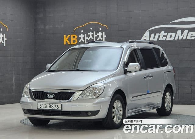 Kia Carnival R топовая версия, 2012 1