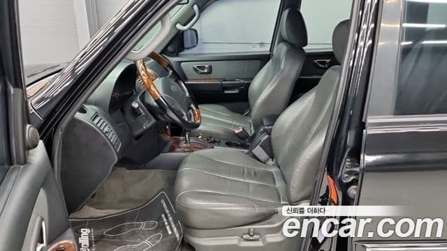 Hyundai 테라칸 топовая версия чёрный Special, 2003 13