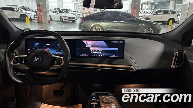 BMW iX xDrive50 Sport Plus, 2024 7