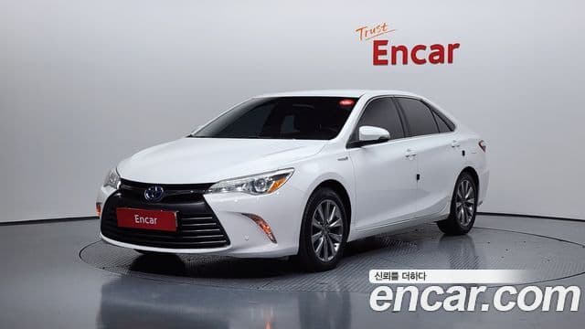 Toyota New 캠리 гибрид LE, 2016 1
