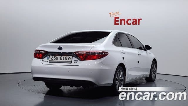 Toyota New 캠리 гибрид LE, 2016 2