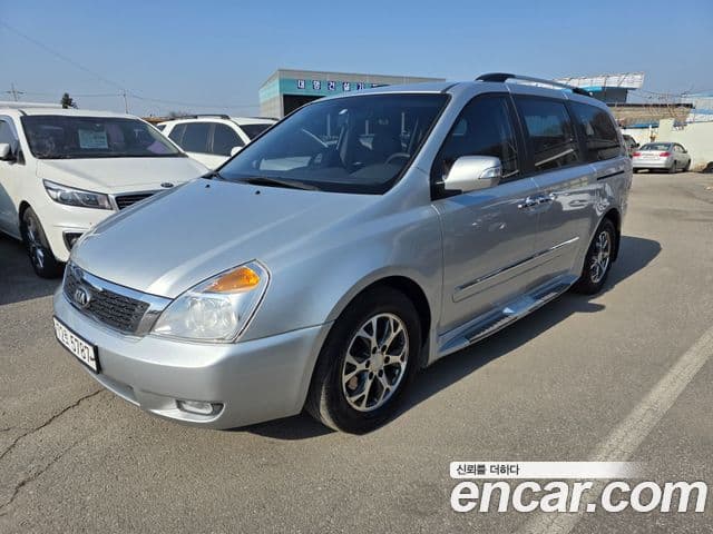 Kia Carnival R топовая версия, 2014 1
