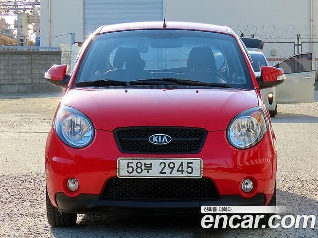 Kia 뉴모닝 люксовая версия Black Premium, 2009 1