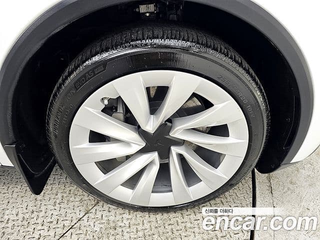 Tesla модель Y Long Range AWD, 2025 все фото