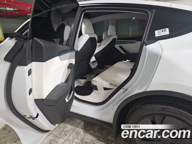 Tesla модель Y, 2025 11