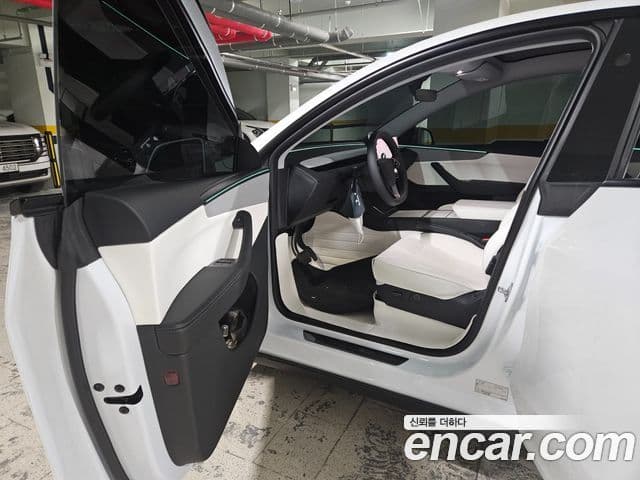 Tesla модель Y, 2025 12